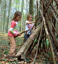 children playing with sticks